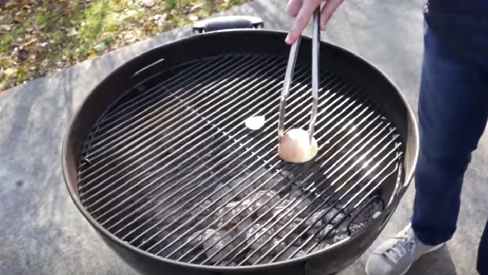 cleaning grill with onions
