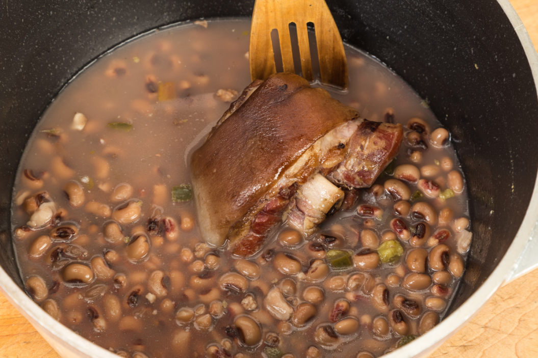 ham hock in pot of beans