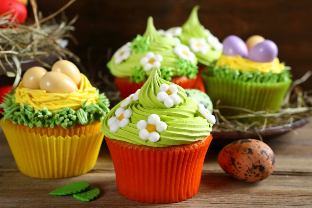 spring cupcakes on table with decorations